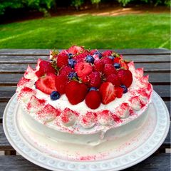 A picture of Strawberry Cake with Cream Cheese Frosting 🎂.