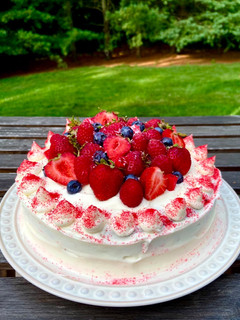 A picture of Strawberry Cake with Cream Cheese Frosting 🎂.