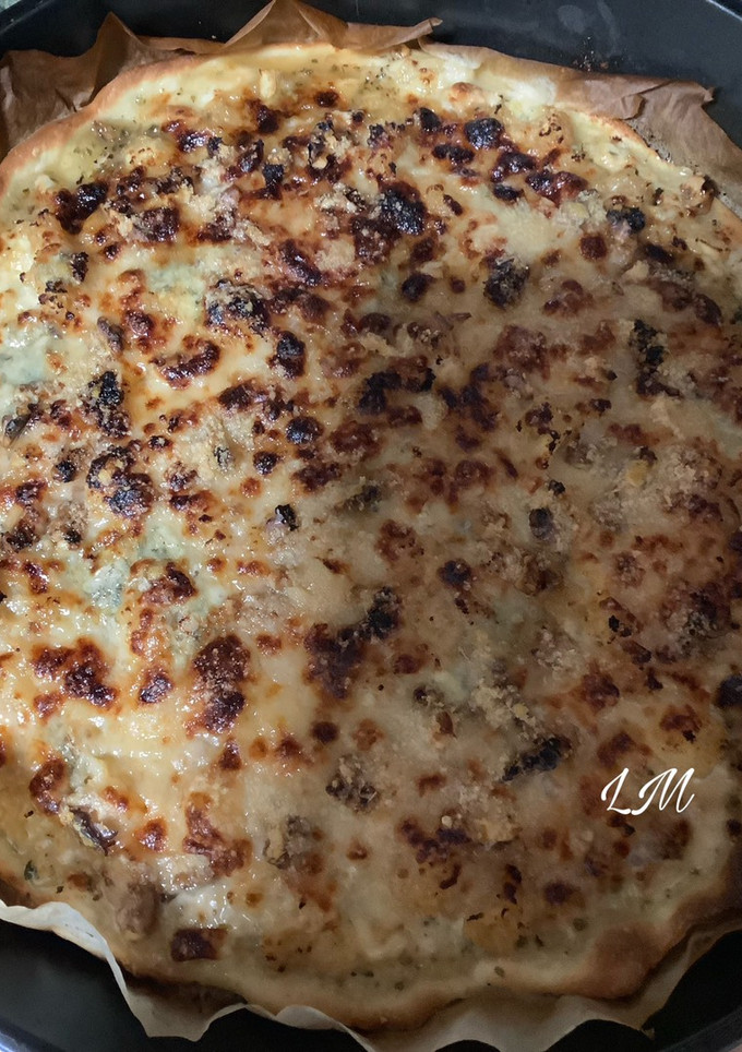 Una foto de Pizza de manzana y queso