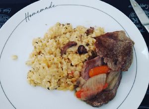 Una foto de Risotto con provolone