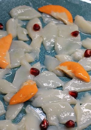 Une photo de Carpaccio de Saint Jacques
