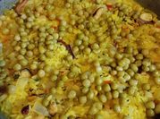 Una foto de sofrito para paella