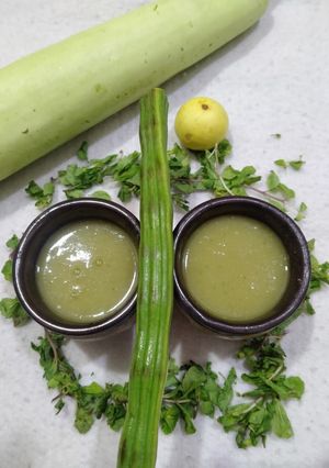 A picture of Lauki and drumsticks soup.