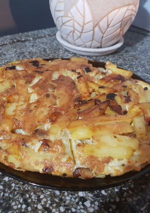 Una foto de Tortilla de papas y hongos shiitake