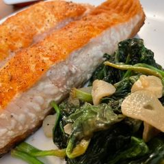 A picture of Pan Fried Salmon with Zesty Sautéd Spinach.