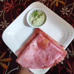 A picture of Beetroot dosa.