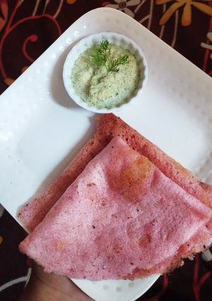 A picture of Beetroot dosa.