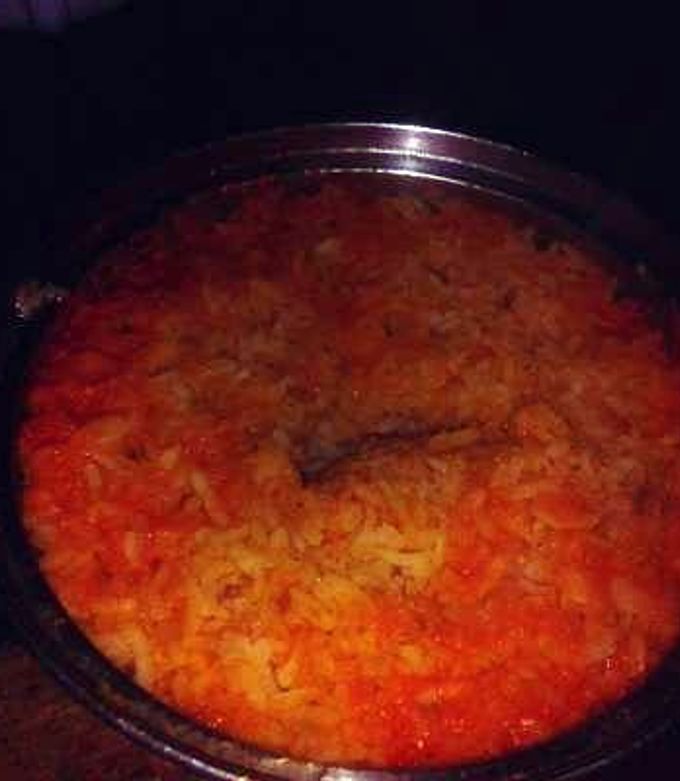 Una foto de Sopa de arroz roja