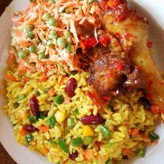 A picture of Fried rice,salad and fried chicken.