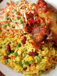 A picture of Fried rice,salad and fried chicken.