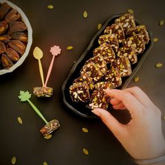A picture of Dates and nuts roll.