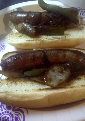 A picture of Italian Sausage with peppers and onions.