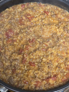 Una foto de Risotto con tomate y carne de cerdo