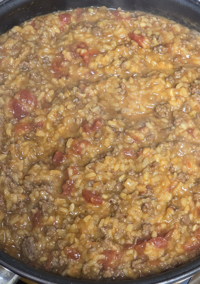 Una foto de Risotto con tomate y carne de cerdo