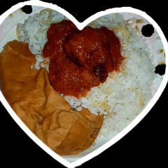 A picture of While rice and leafy moimoi.