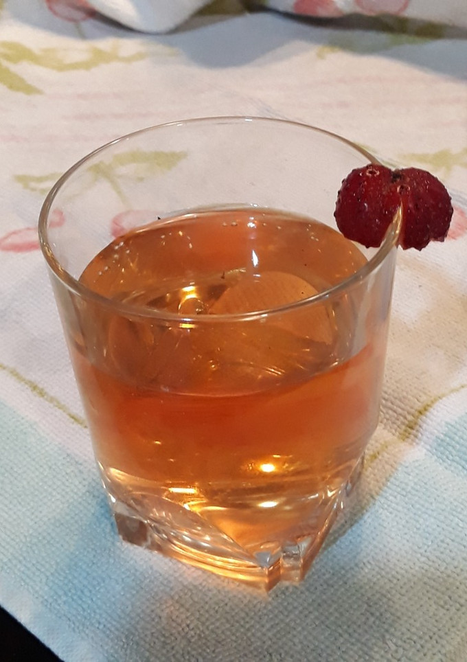 Una foto de Infusión de te verde con fresas
