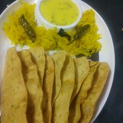 A picture of Fafada-Kadhi with Grated Raw Papaya.