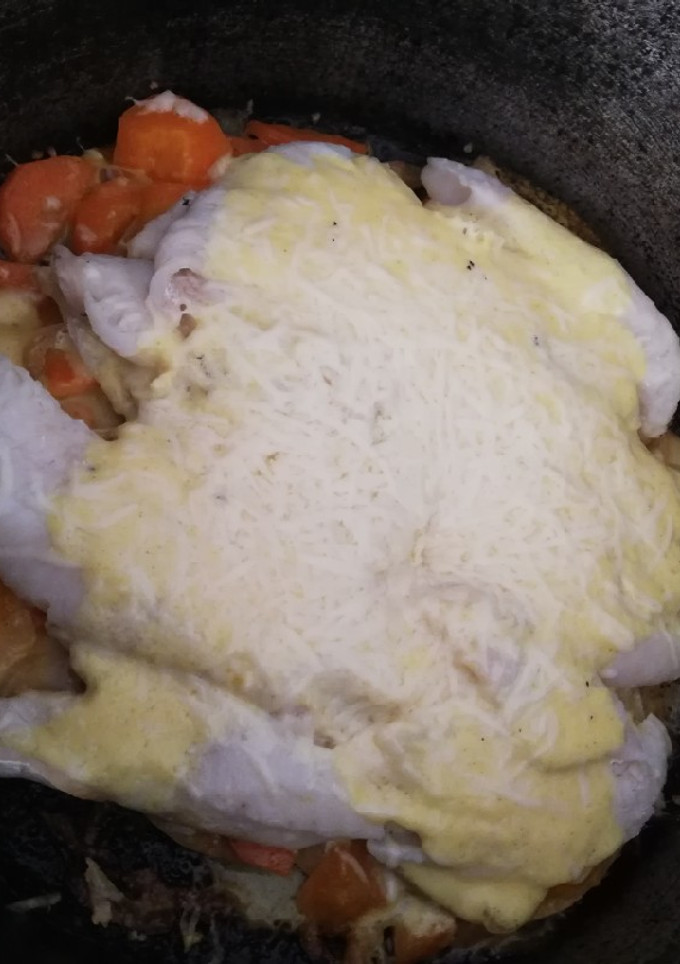 Una foto de Pescado con colchón de verduras