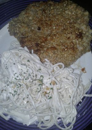 Una foto de Milanesas de nalga rebosadas en avena y fideos con queso blanco y provenzal