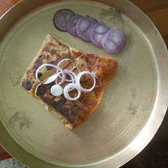 A picture of Punjabi Masala atta kulcha.