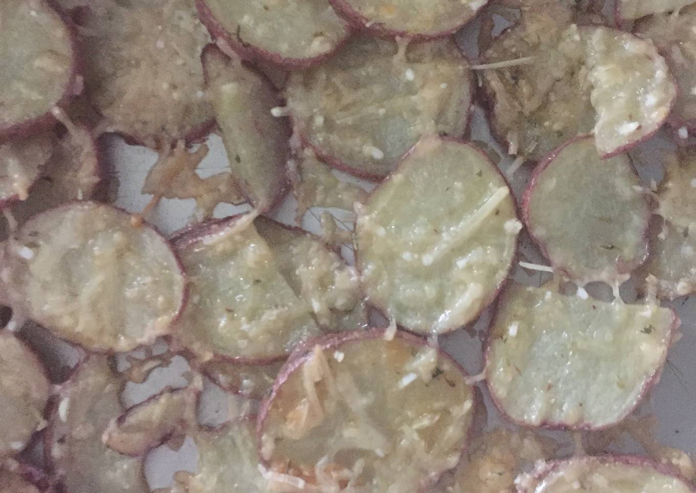 Baked potatoes with herbs and parmesan
