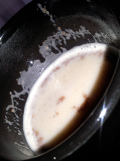 A picture of nutmeg and soy milk.