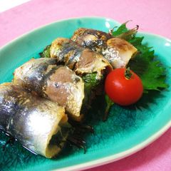 A picture of Grilled Sardine Rolls with Umeboshi and Shiso Leaves.