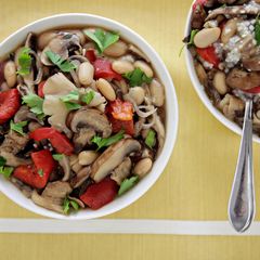 A picture of Ragout of Mixed Mushrooms, Roasted Red Peppers and Cannellini Beans over Garlic-Parmesan Grits.