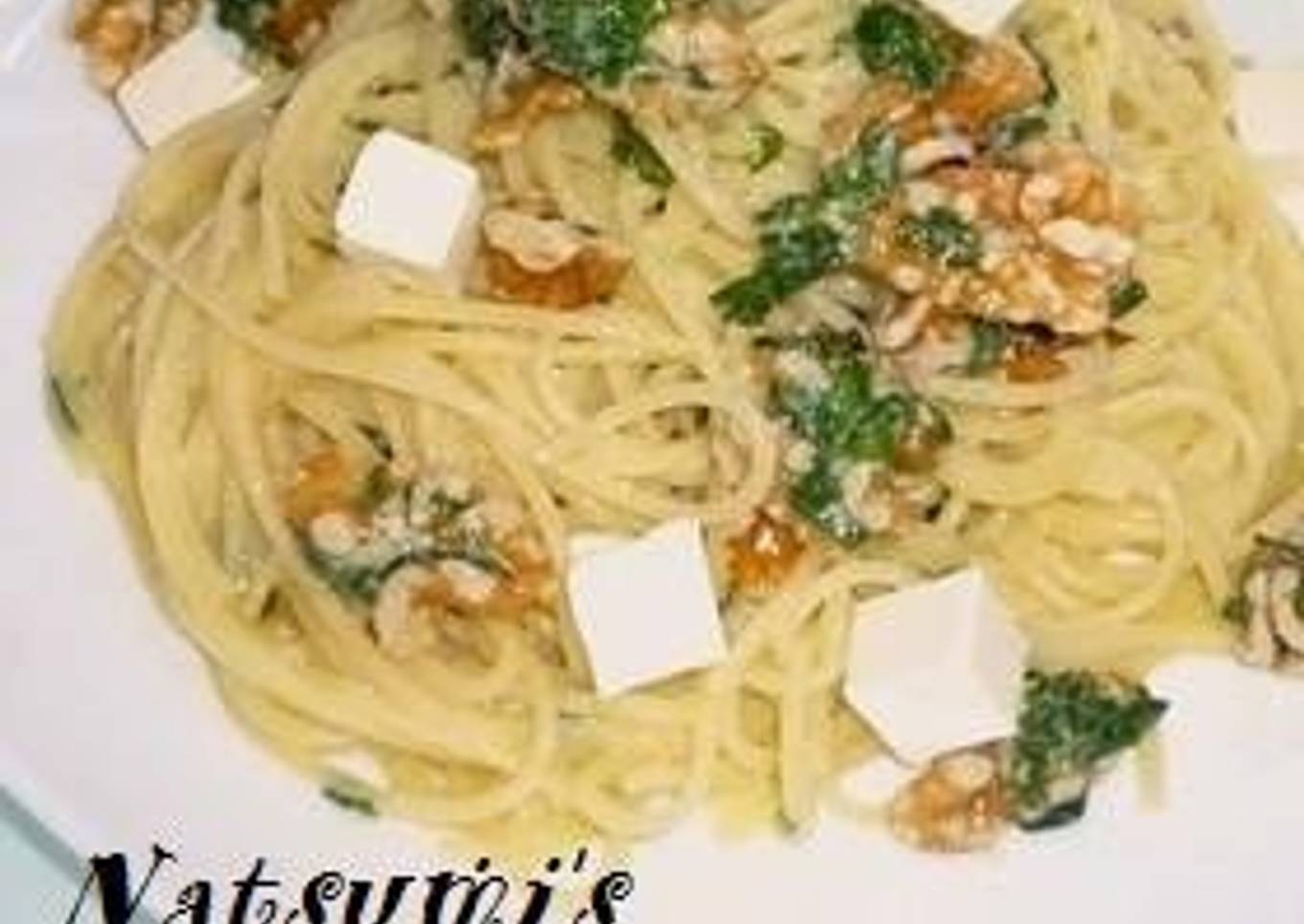 Soft cold basil pasta with nuts and cheese