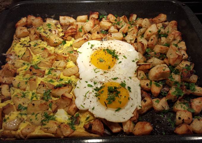 Roasted herb and garlic potatoes with eggs cooked two ways