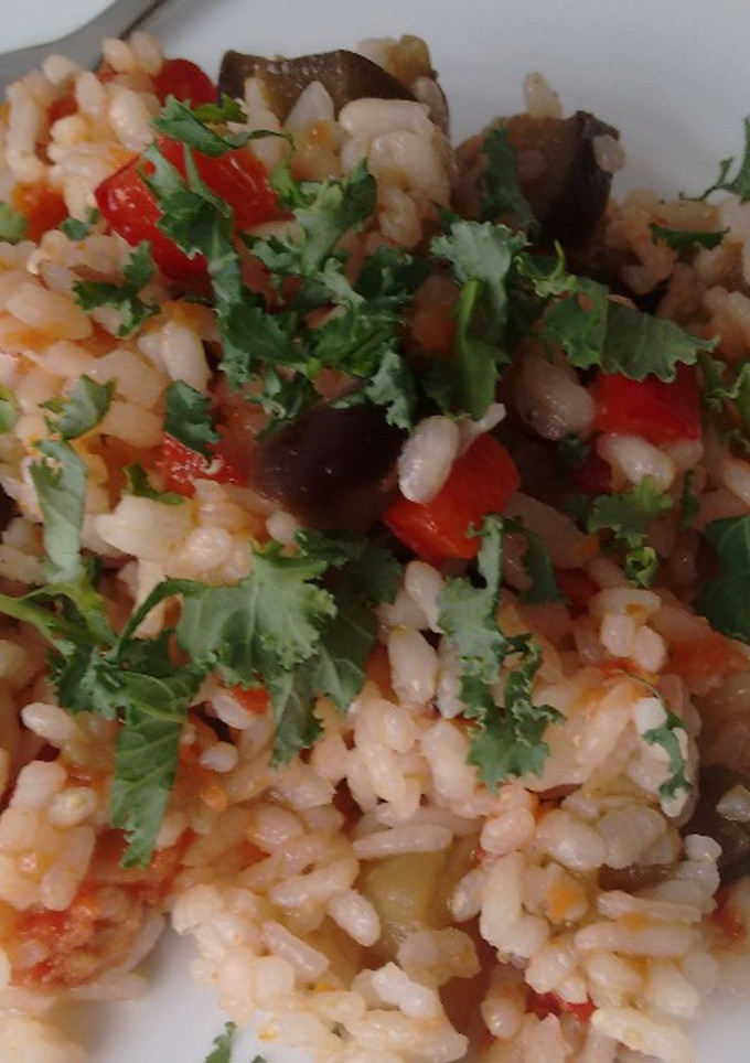 Una foto de Arroz prebiótico con berenjena y tomate seco enriquecido con Agua de Mar