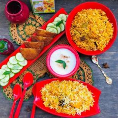 A picture of Karachi Famous Aloo chicken biryani.