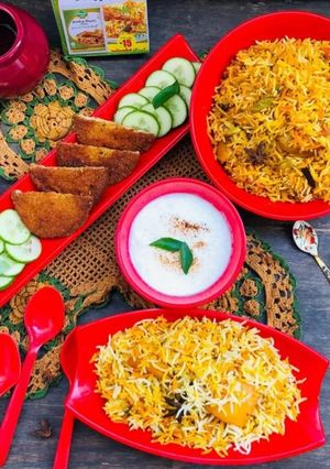 A picture of Karachi Famous Aloo chicken biryani.