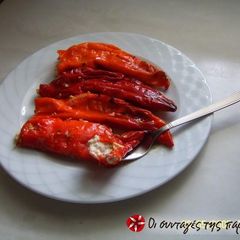 A picture of Sweet red peppers stuffed with cheese.