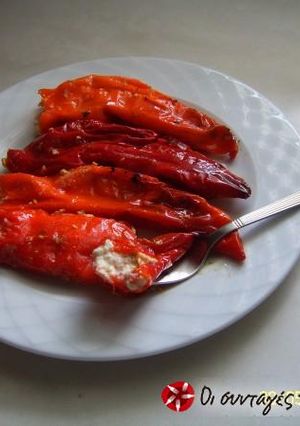 A picture of Sweet red peppers stuffed with cheese.