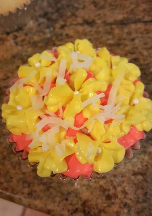 A picture of Banana, Pineapple, & Coconut Cupcakes.
