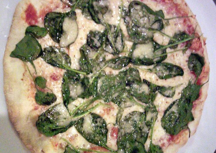 Spinach and cheese pizza