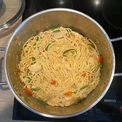 A picture of Mixed Veggies with Spaghetti.