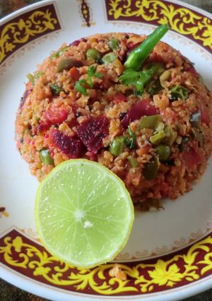A picture of Oats upma with beetroot and vegetable.