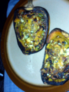 A picture of stuffed roasted squash.
