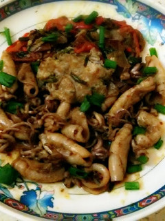 A picture of Deep fried marinated calamari & tentacles.