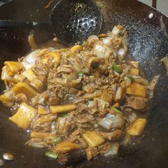 A picture of Szechuan Pork Belly with Rice Cakes.
