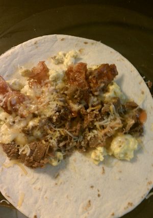 A picture of Meaty breakfast burritos.