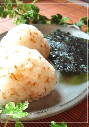 A picture of Fragrant with Sesame Oil - Onigiri (Rice Balls) with Dashida Soup Stock.
