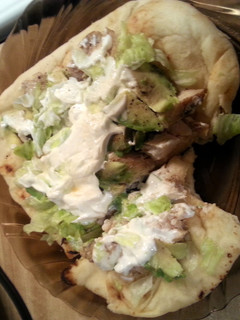 A picture of Grilled Chicken on flatbread.