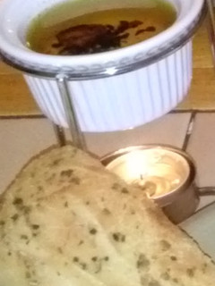 A picture of Bread with Dipping Oil.
