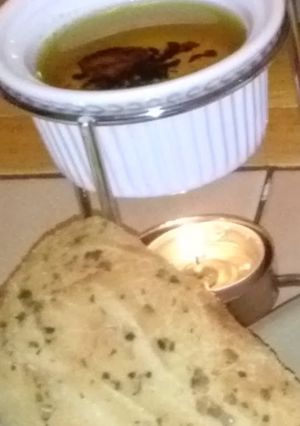A picture of Bread with Dipping Oil.