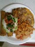 Rolled tacos with refried beans and Spanish rice