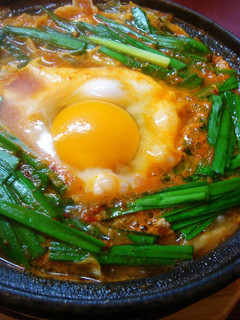 A picture of Kimchi Jjigae Stewed Udon.