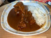 Una foto de chile pasilla con mole